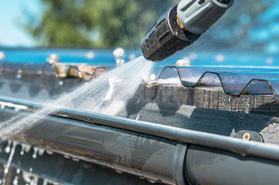 hot pressure wash of a residential gutter